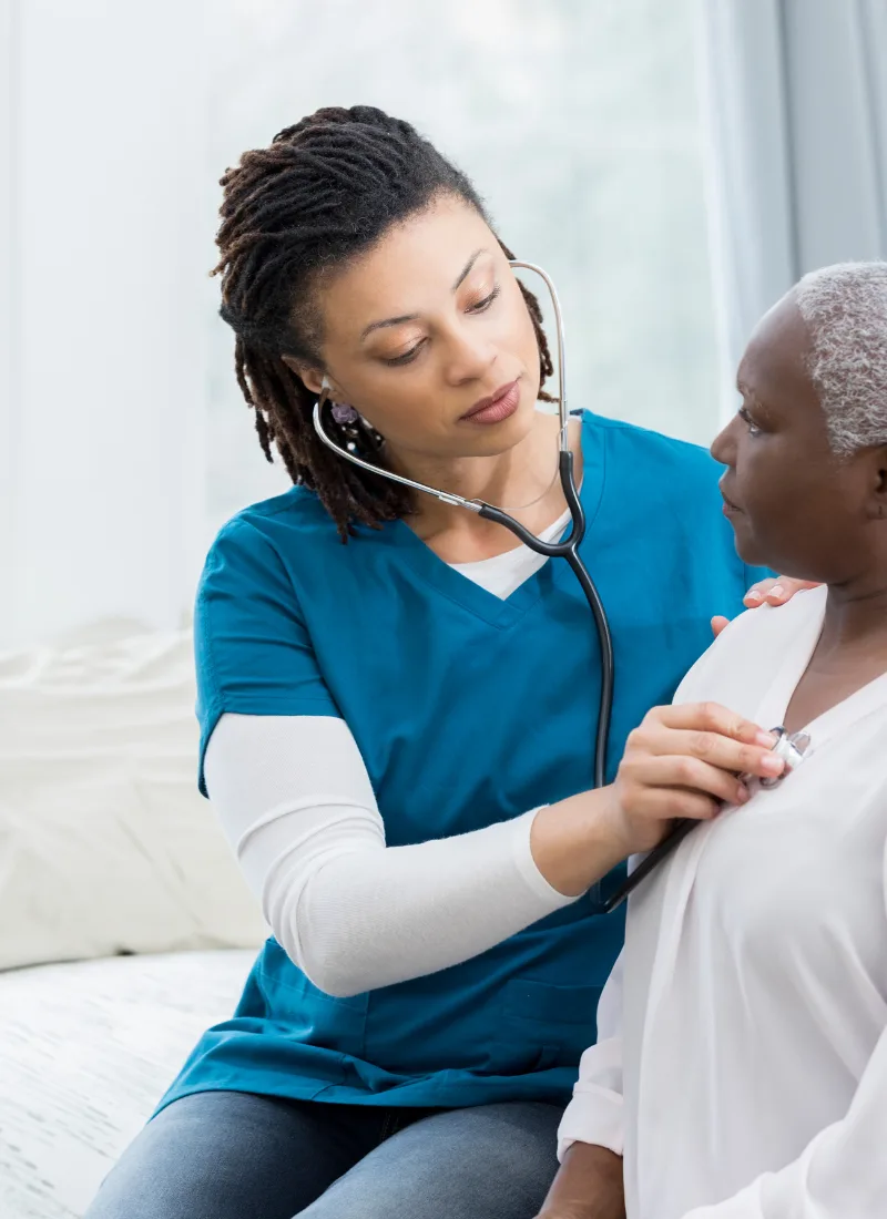 family medicine physical exam with stethoscope for senior patient