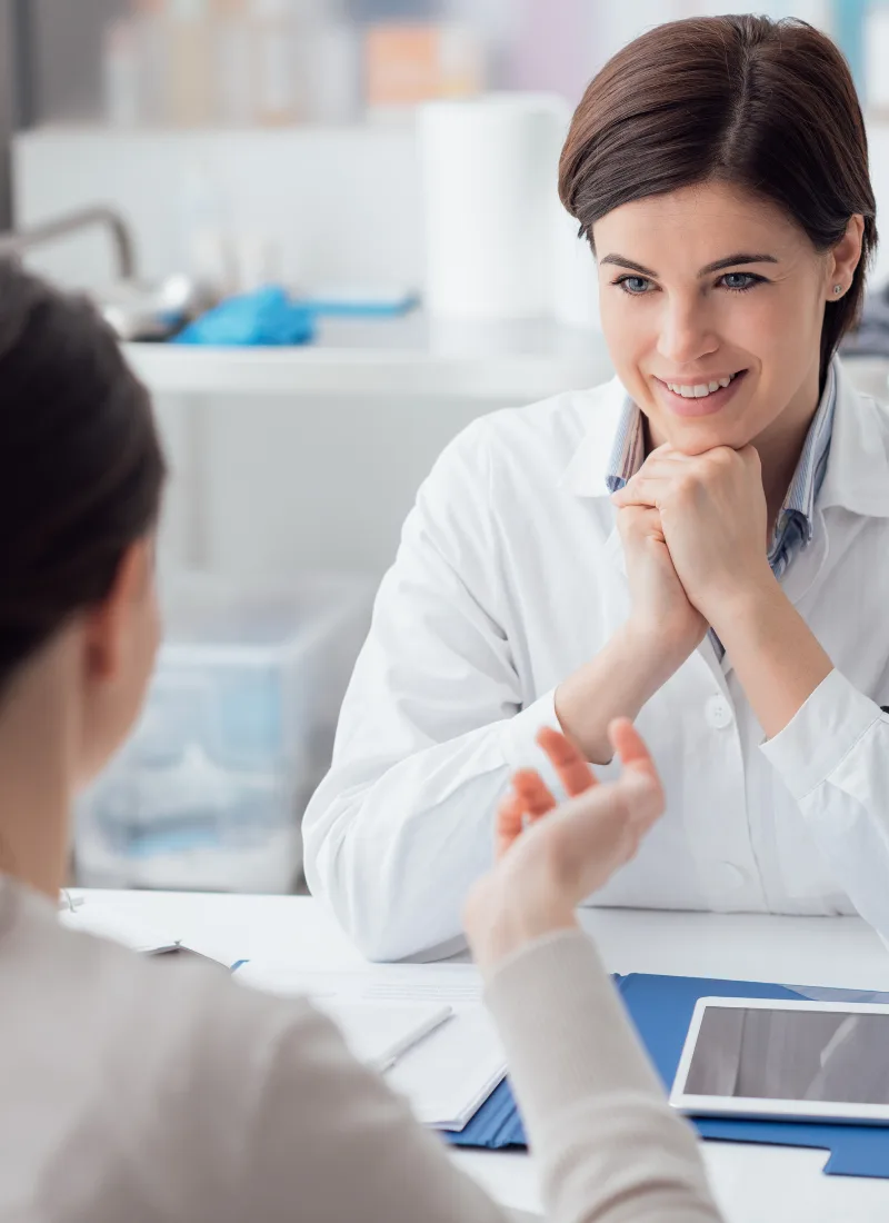 primary care office visit with family doctor and patient
