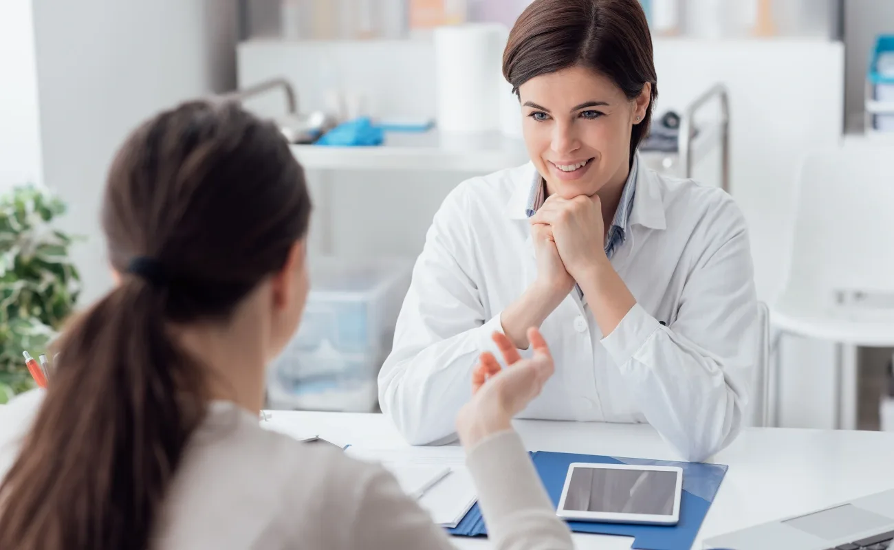 primary care office visit with family doctor and patient
