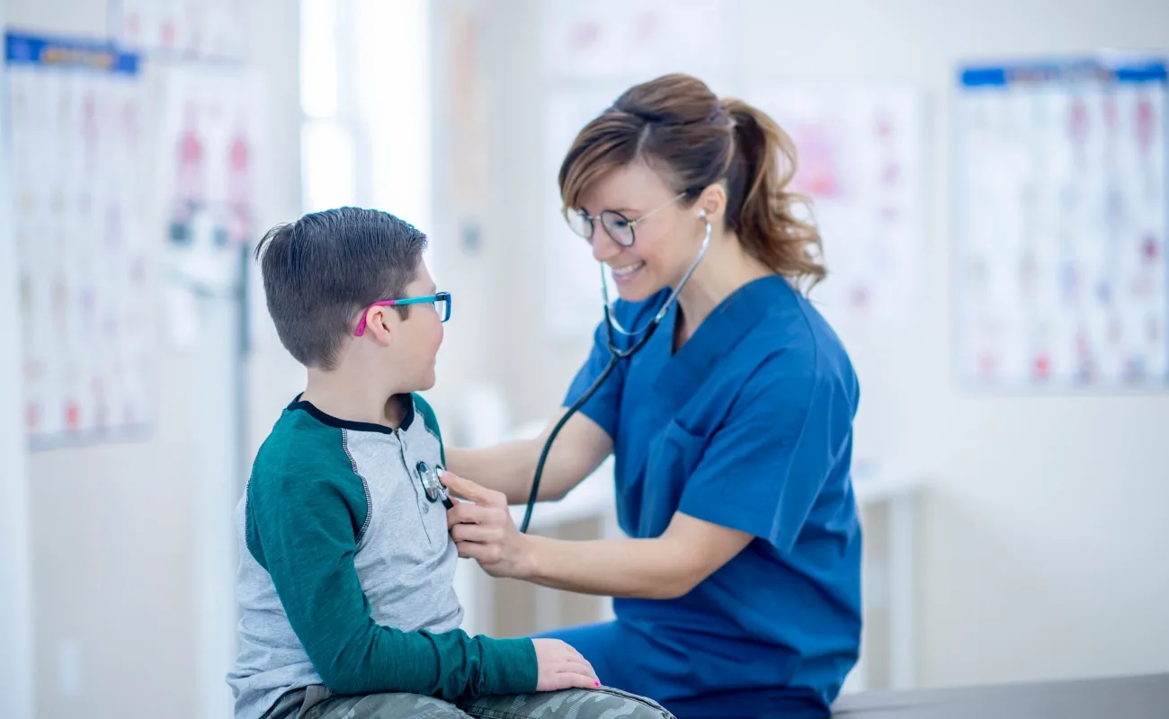 youth physical exam family medicine checkup with stethoscope